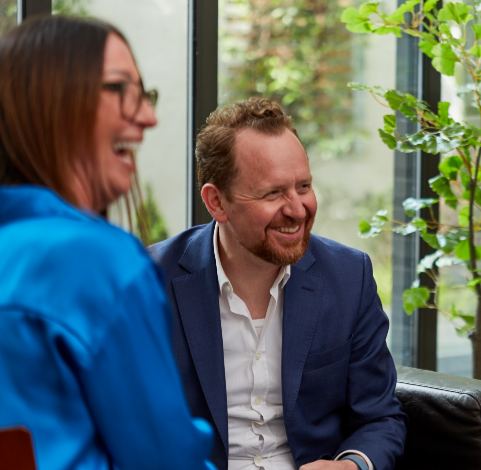 Fox partners smiling together